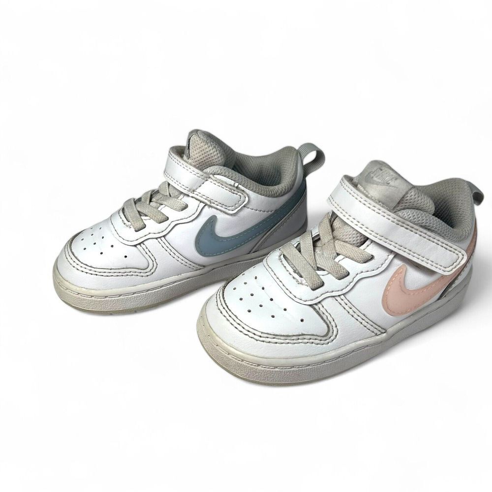 Nike Kids White Sneakers with Blue and Pink Swooshes